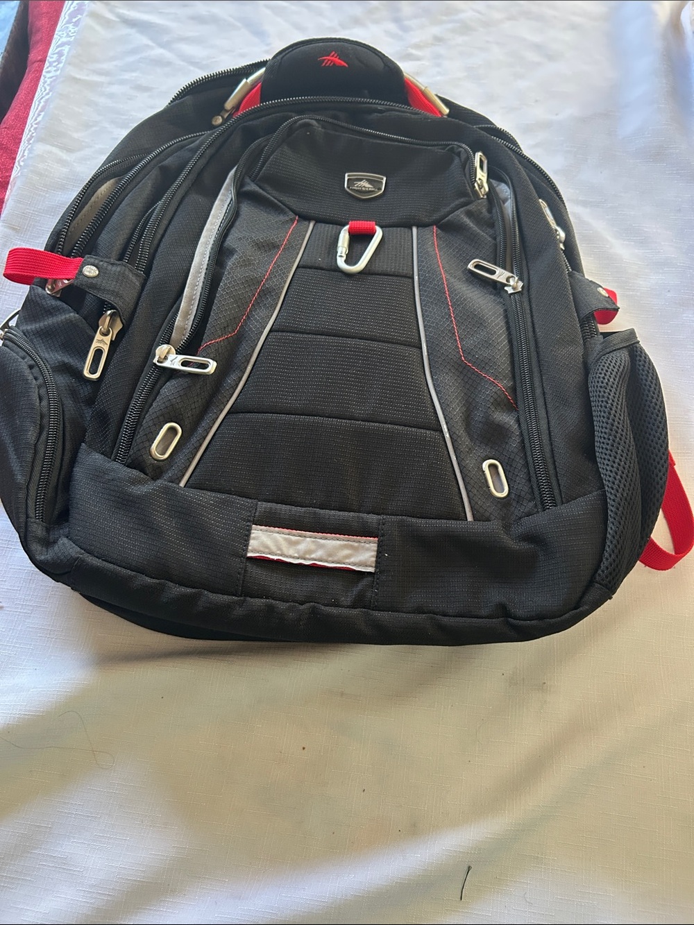 High Sierra Black Backpack with Red and Silver Accents